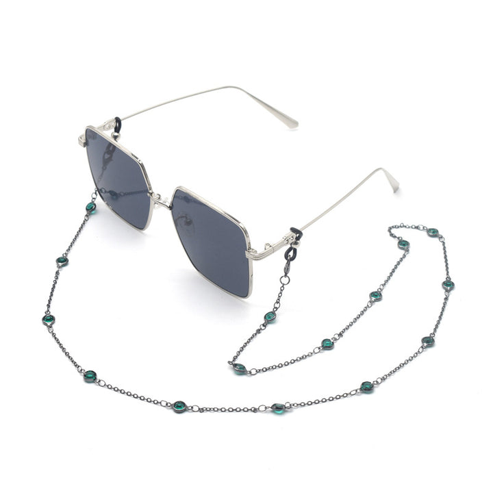 Stylische quadratische Sonnenbrille mit dekorativer Kette Karnz