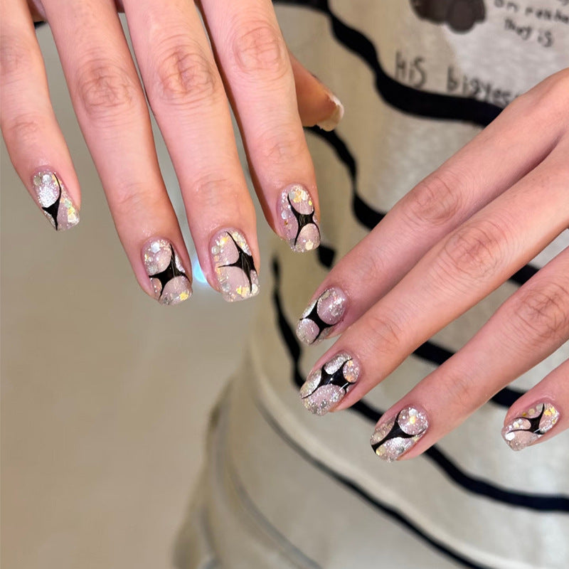 Dekoratives Press-On-Nagelset mit Stern- und Schleifenmotiven Karnz