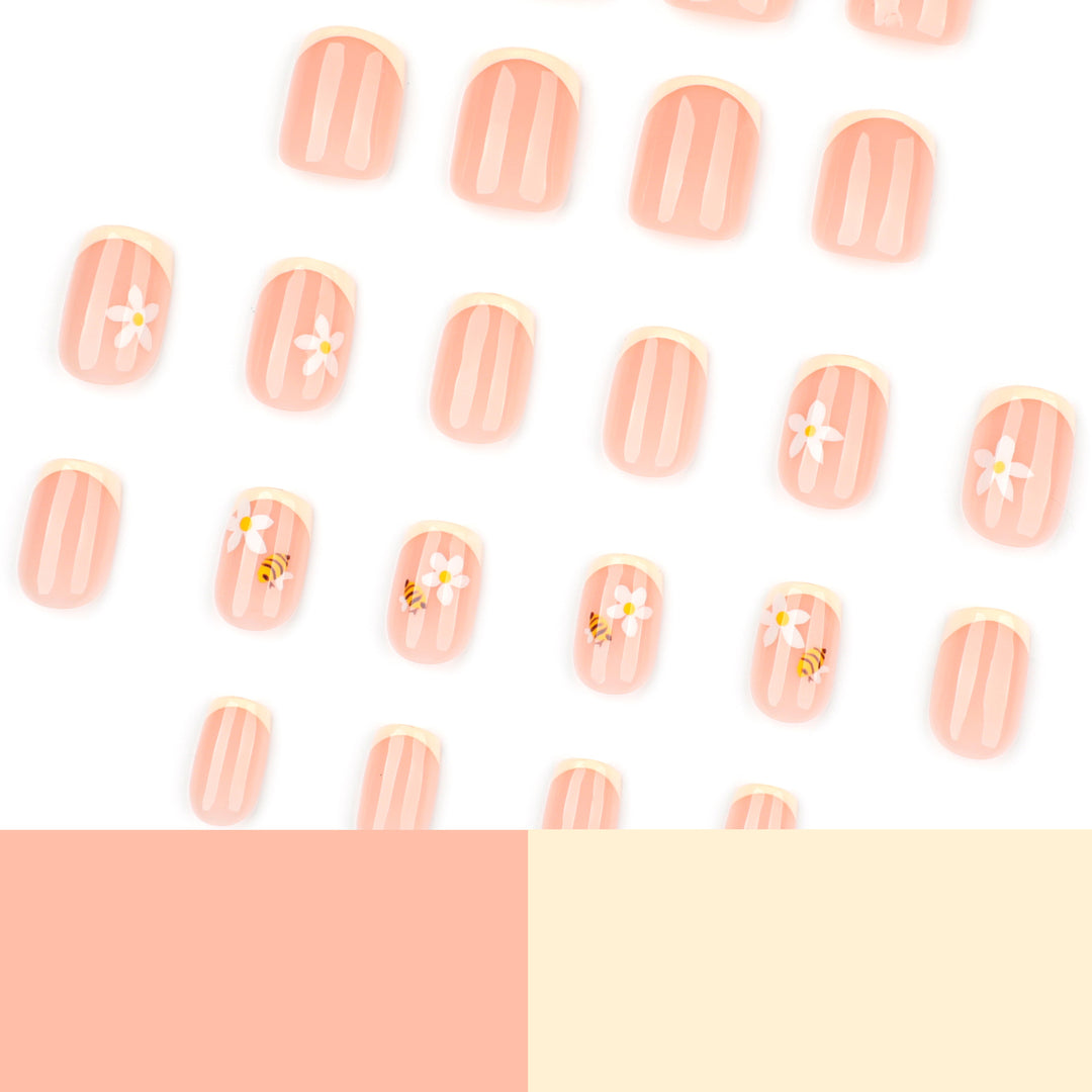 Künstliche Nagelkunst mit Blüten- und Bienenmotiven Karnz