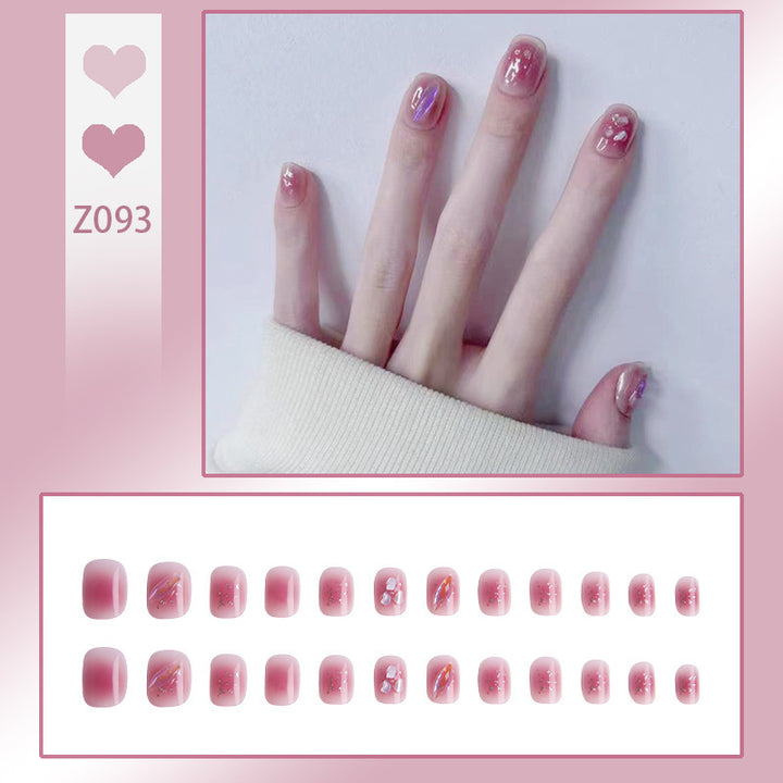 Kunstnagelset mit elegantem French-Tipp und Glitzerakzenten Karnz
