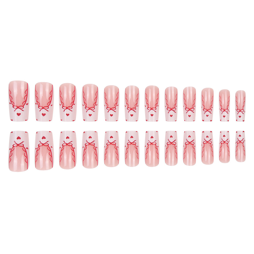 Dekoratives Langes Press-On-Nagelset mit Schleifen- und Herzdesign Karnz