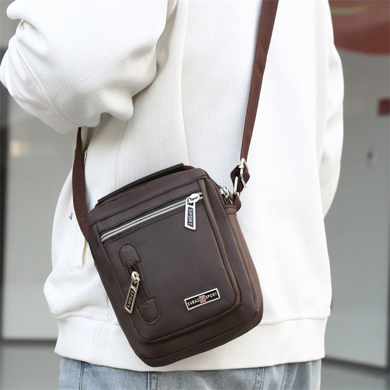 Strukturierte Crossbody-Organizer-Tasche