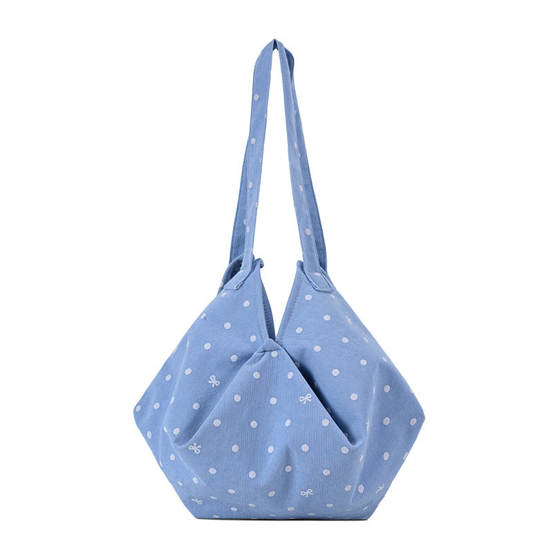 Moderne gepunktete Schultertasche