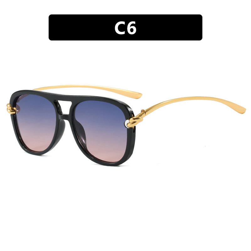 Damen sportliche Sonnenbrille mit breitem Kunststoffrahmen und UV-Schutz Karnz