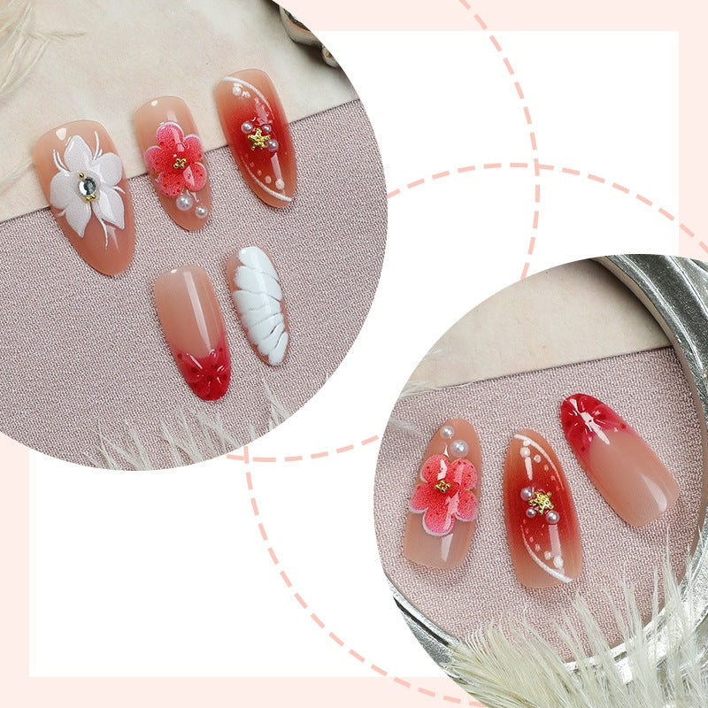 Künstliches Kunstnagelset mit floralem Design und glamourösen Akzenten Karnz