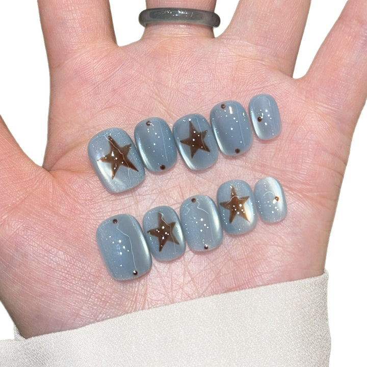 Künstliche Nagelspitzen mit Sterndesign Karnz