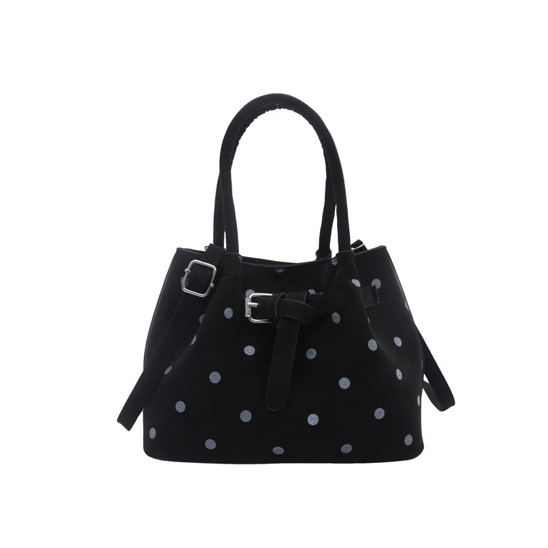 Legere Wildleder-Punktedot-Handtasche