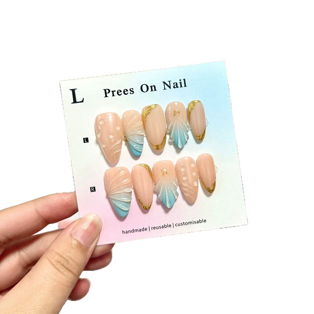 Künstlerisches Press-On-Nagelset mit Muschelmotiven
