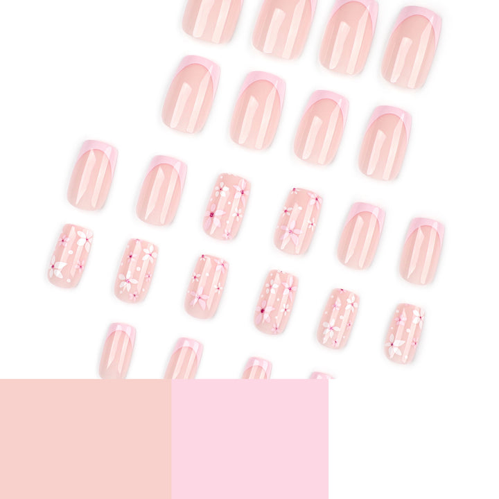 Kunstvolle Nagelverlängerungen mit Blumenmotiven Karnz