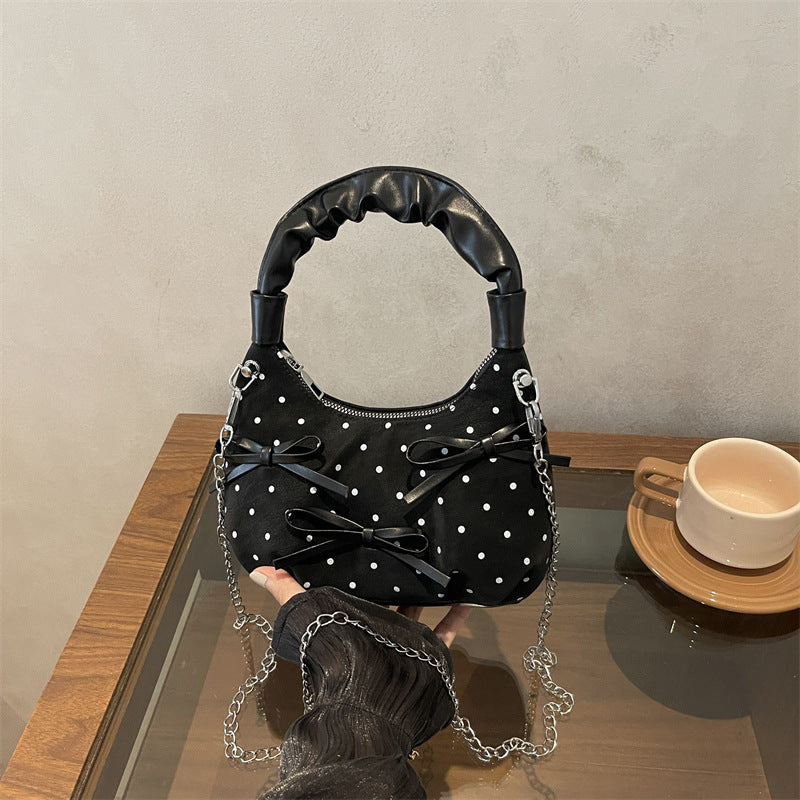 Stylische gepunktete Mini-Handtasche
