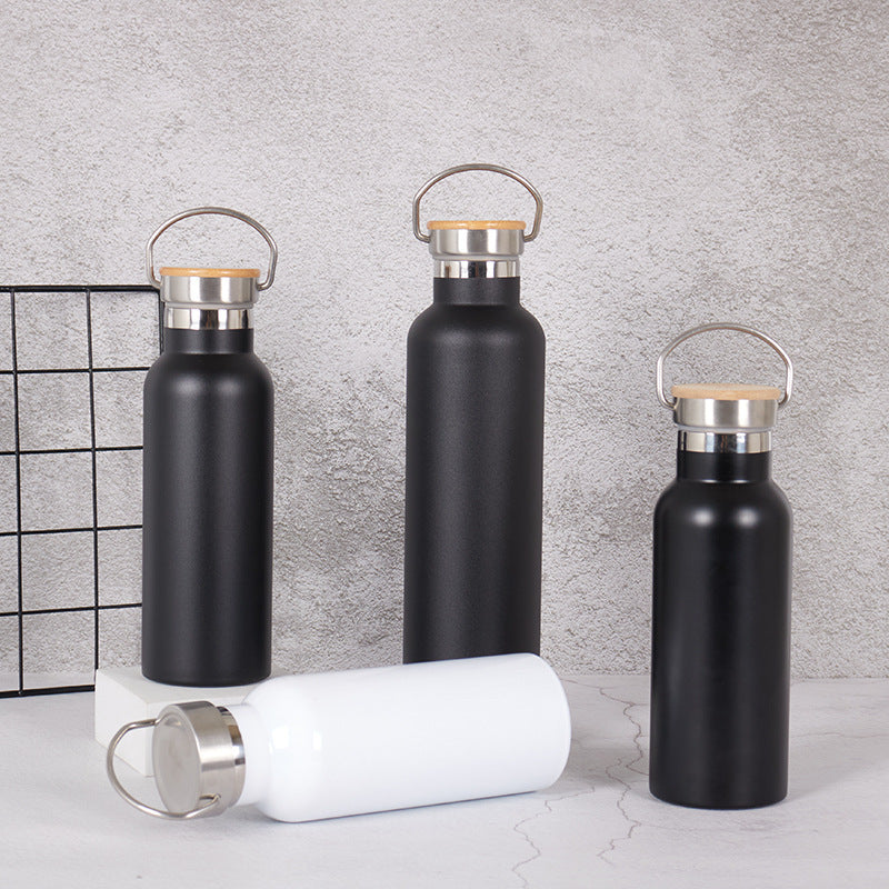 Damen Edelstahl Trinkflasche mit Bambusdeckel und Tragegriff Karnz