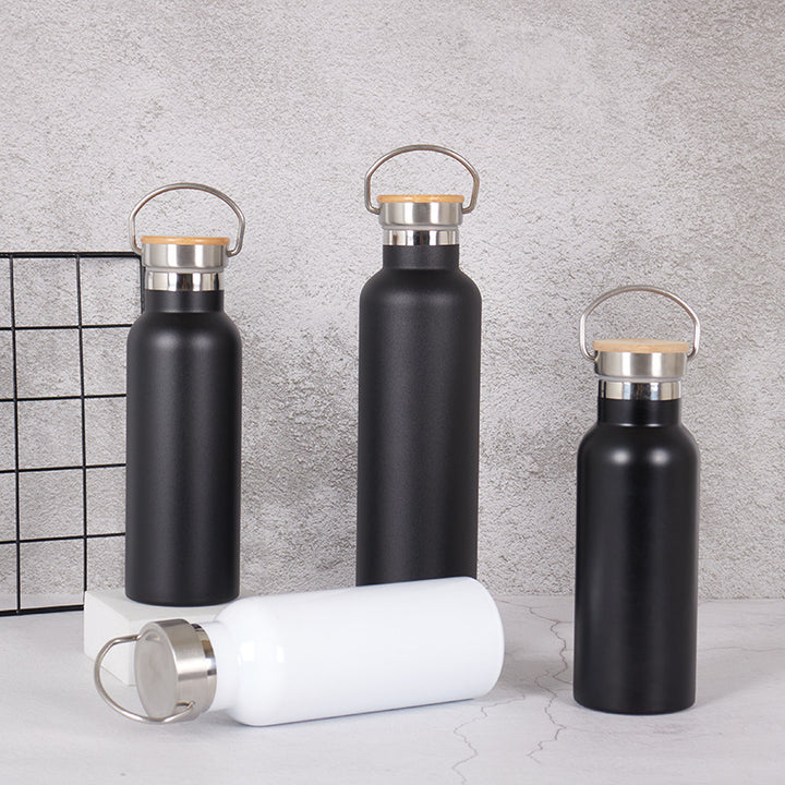 Damen Edelstahl Trinkflasche mit Bambusdeckel und Tragegriff Karnz