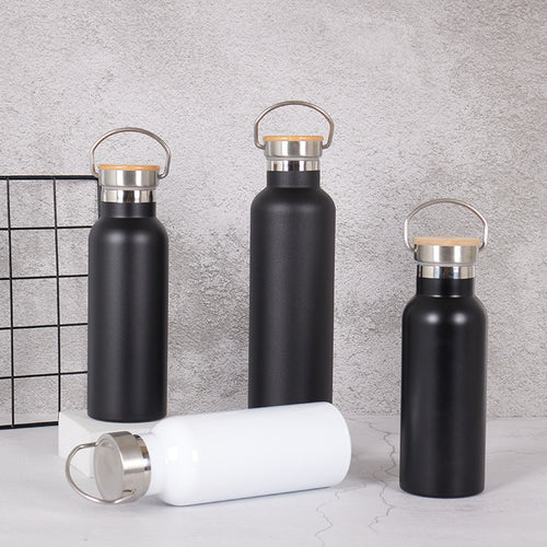 Damen Edelstahl Trinkflasche mit Bambusdeckel und Tragegriff Karnz