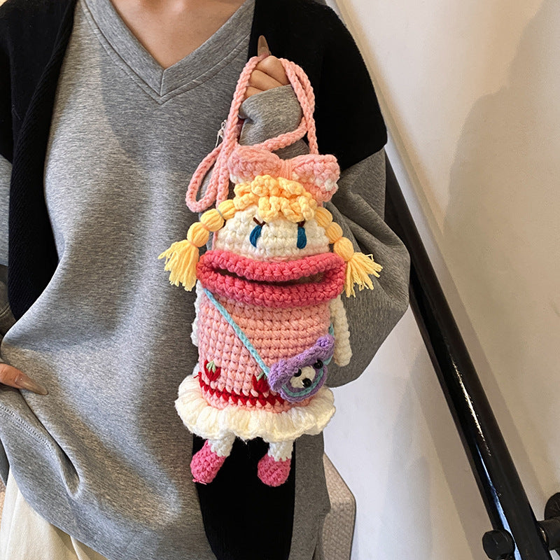 Kreativer Häkelpuppe Rucksack