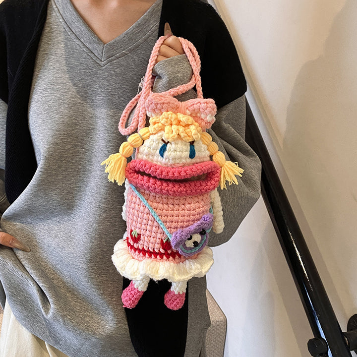 Kreativer Häkelpuppe Rucksack