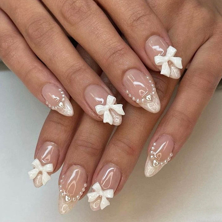 Kunstnagelset mit eleganten Schleifen und 3D-Verzierungen Karnz