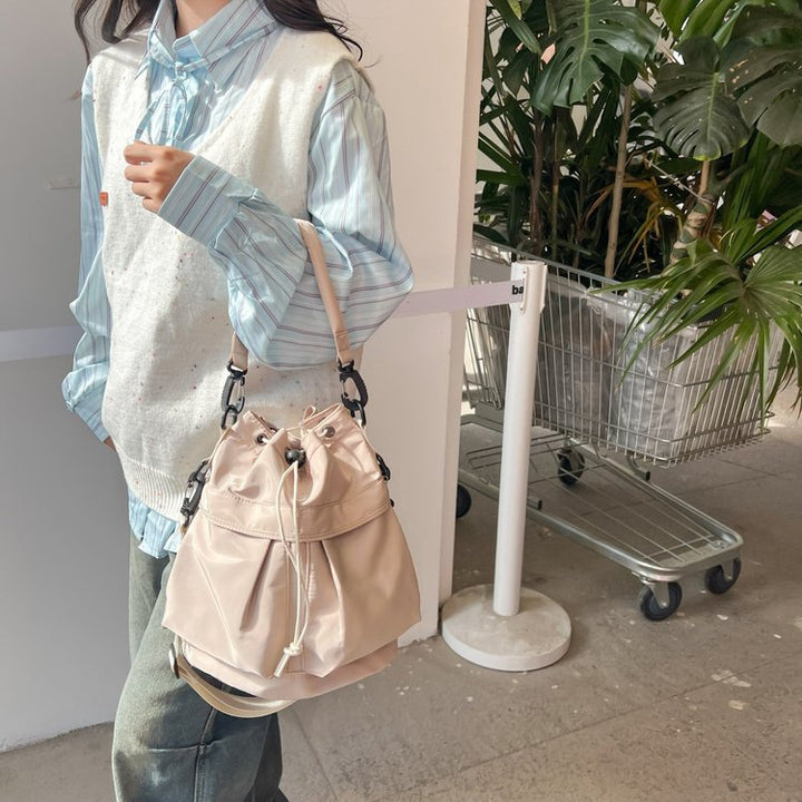Stilvolle Bucket-Handtasche Karnz