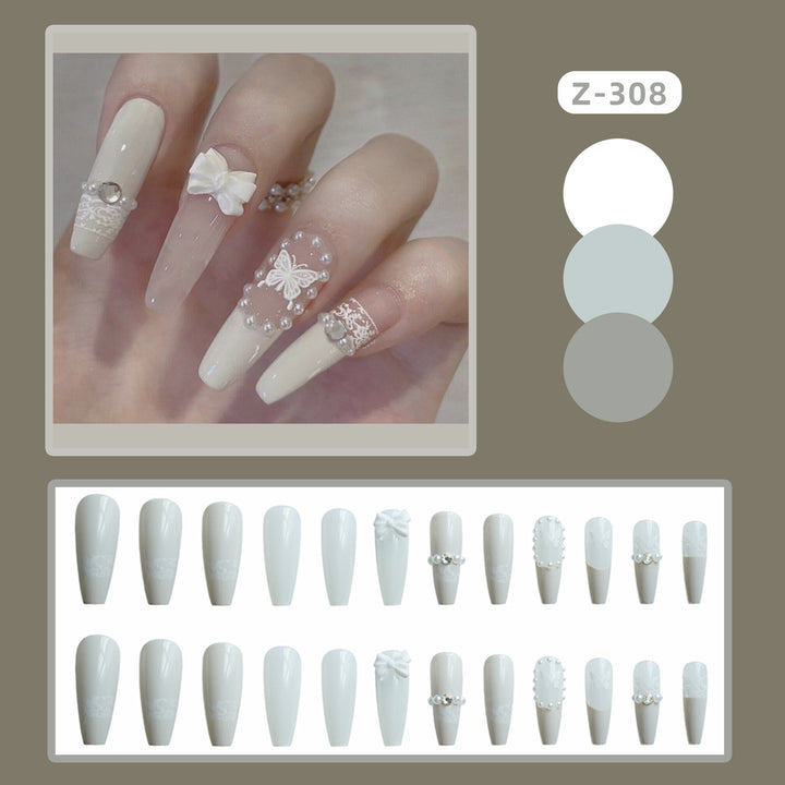 Elegantes dekoratives Press-On-Nagelkunstset mit Schmetterlingsakzenten