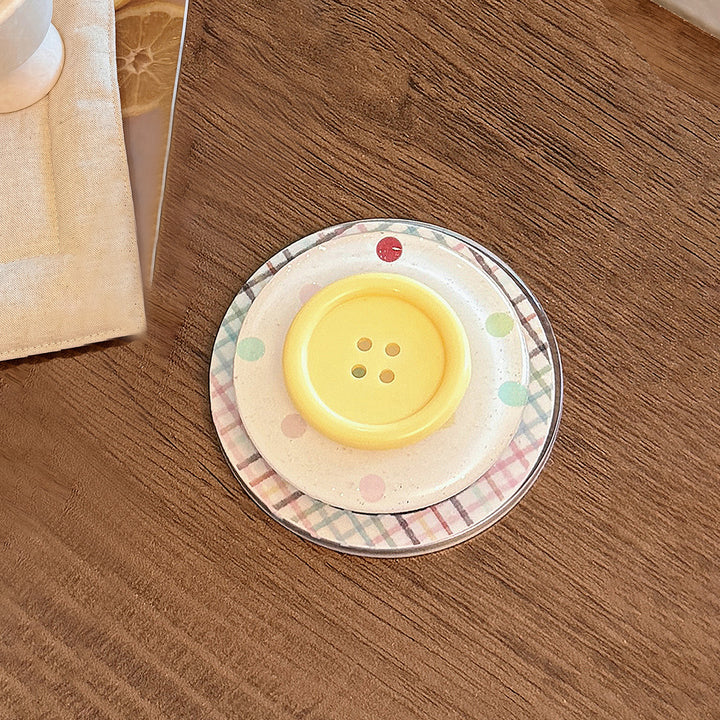 Dekorativer Untersetzer im Button-Design Karnz