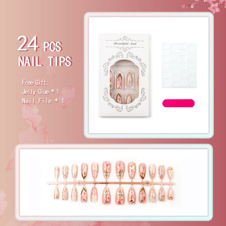 Kunstnagelset mit floralem und goldenen Akzent Karnz