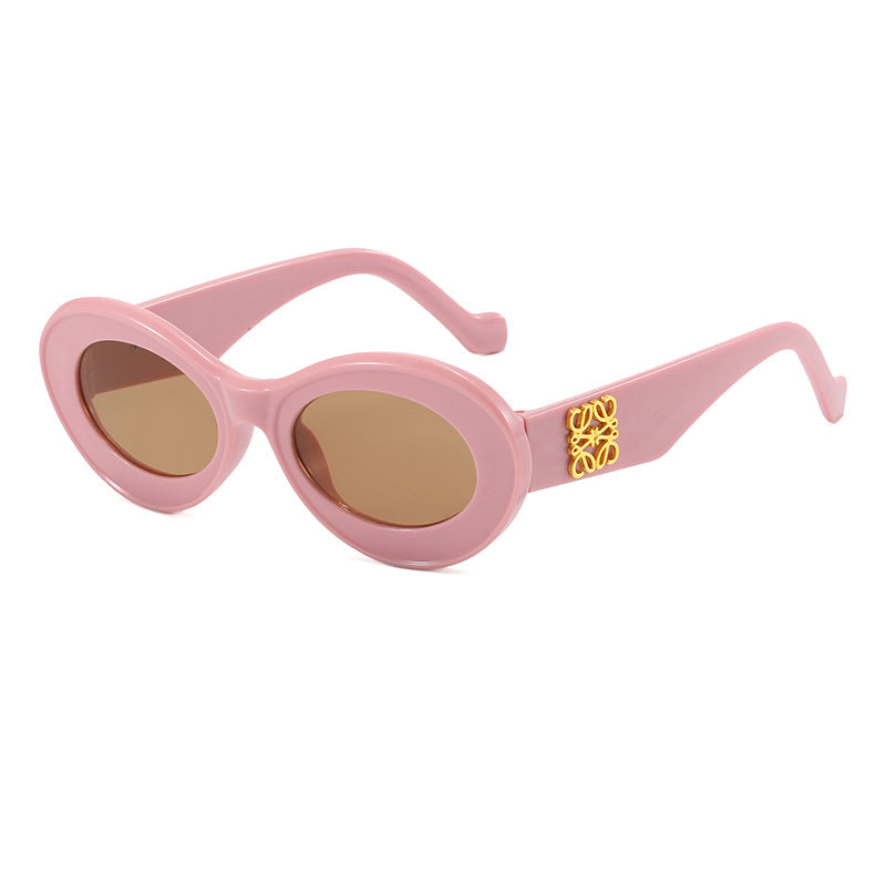 Damen modische Sonnenbrille mit ovalem Rahmen und goldenen Applikationen Karnz