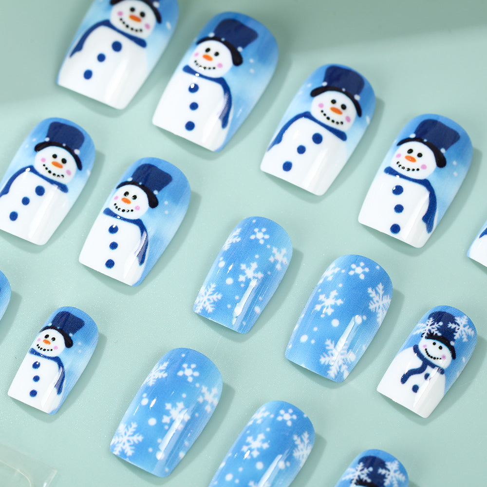 Kunstnägel mit winterlichem Schneemann-Design Karnz