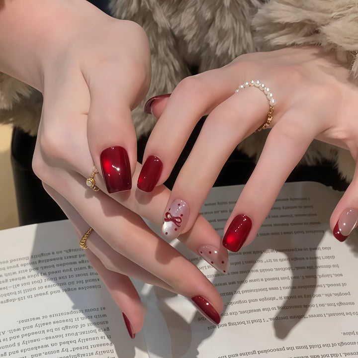 Elegante Kunstnagelset mit Dekorativer Schleifenakzenten Karnz