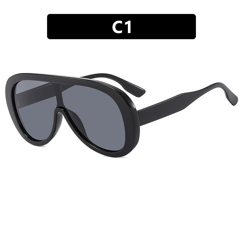 Damen futuristische Sportsonnenbrille mit breiter Sichtscheibe und UV-Schutz Karnz