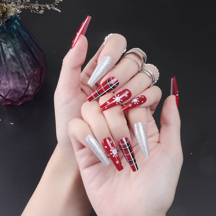 Künstlerisches Press-On-Nagelset mit Feiertagsthema Karnz