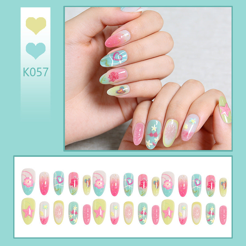 Kunstvolle 3D Nagelspitzen mit maritimem Motiv Karnz