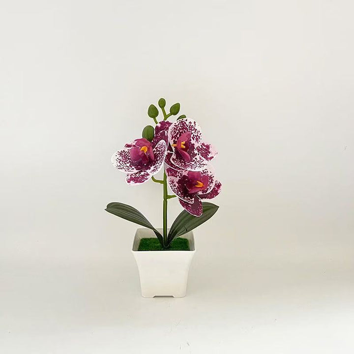 Realistische Künstliche Orchidee in dekorativem Pflanzenpot für Dekoration