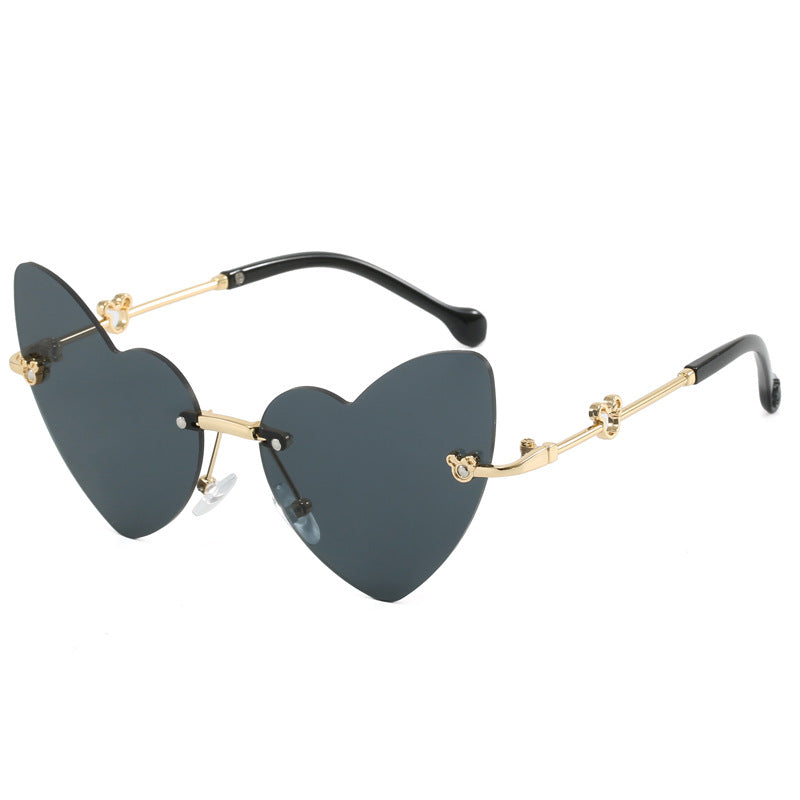 Damen Herzförmige Sonnenbrille mit verziertem Rahmen Karnz