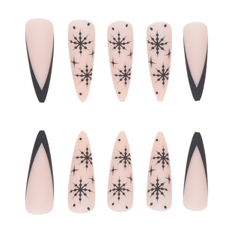 Lange Stiletto Press-On Nagelkunst mit Schneeflocken-Design Karnz