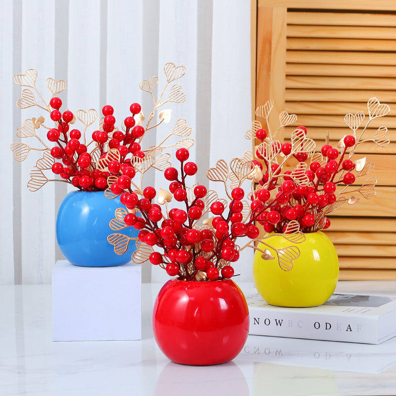 Herzförmige dekorative Blumenarrangement