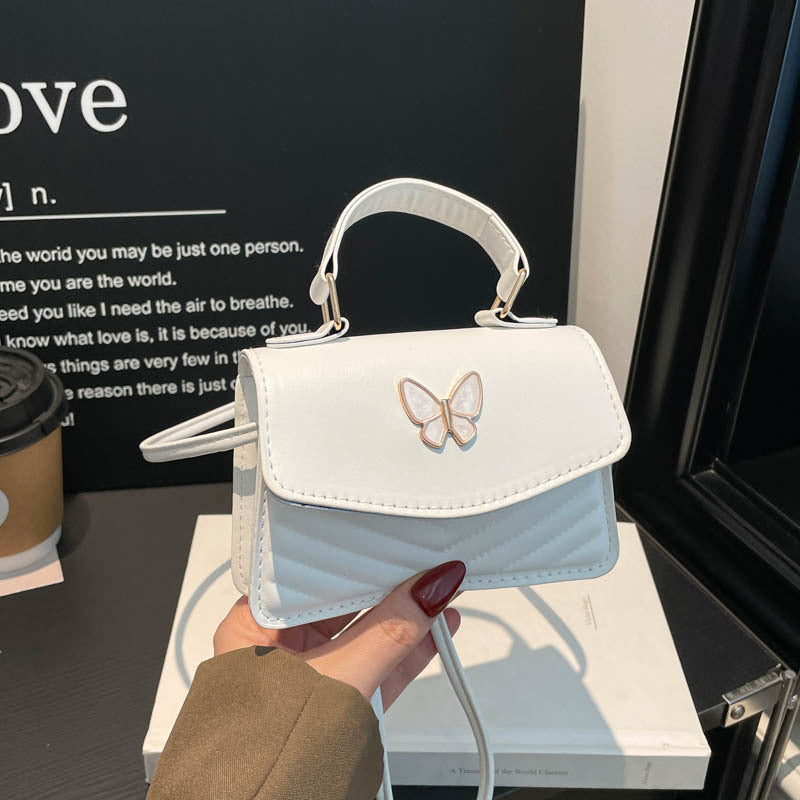 Schmetterlings-verzierte Handtasche
