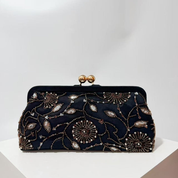 Verzierte Clutch-Handtasche