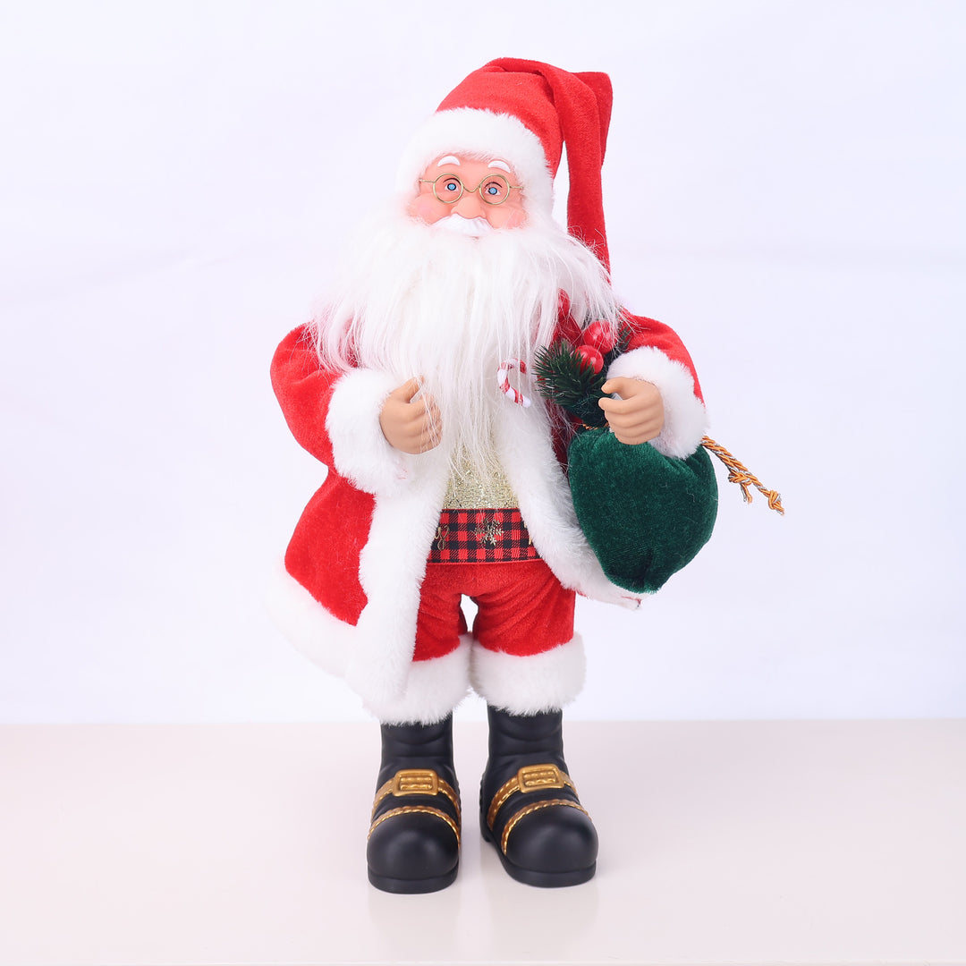 Dekorative Weihnachtsmannfigur mit Süßigkeit