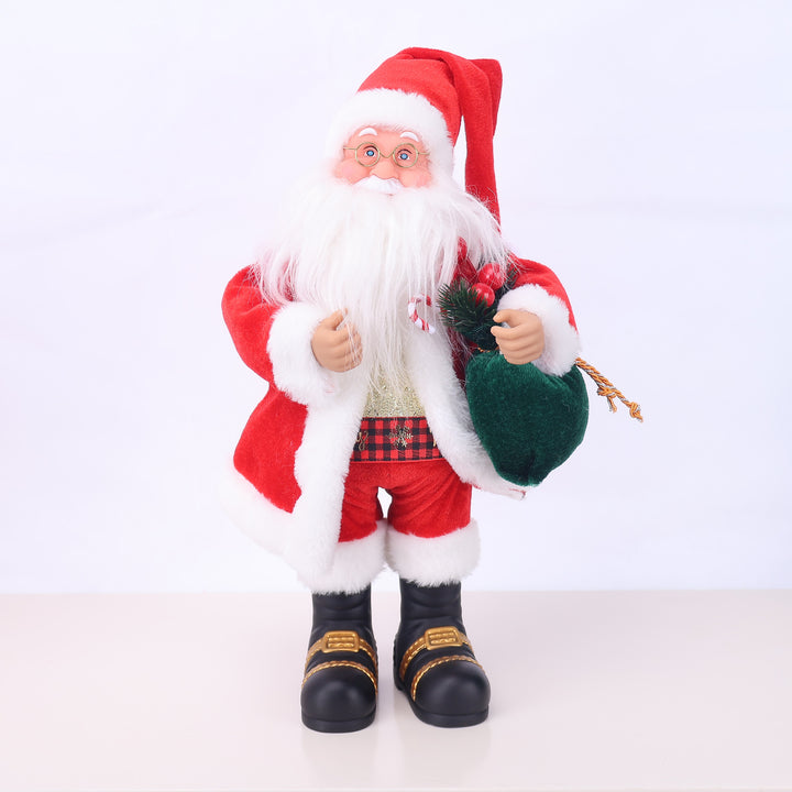 Dekorative Weihnachtsmannfigur mit Süßigkeit
