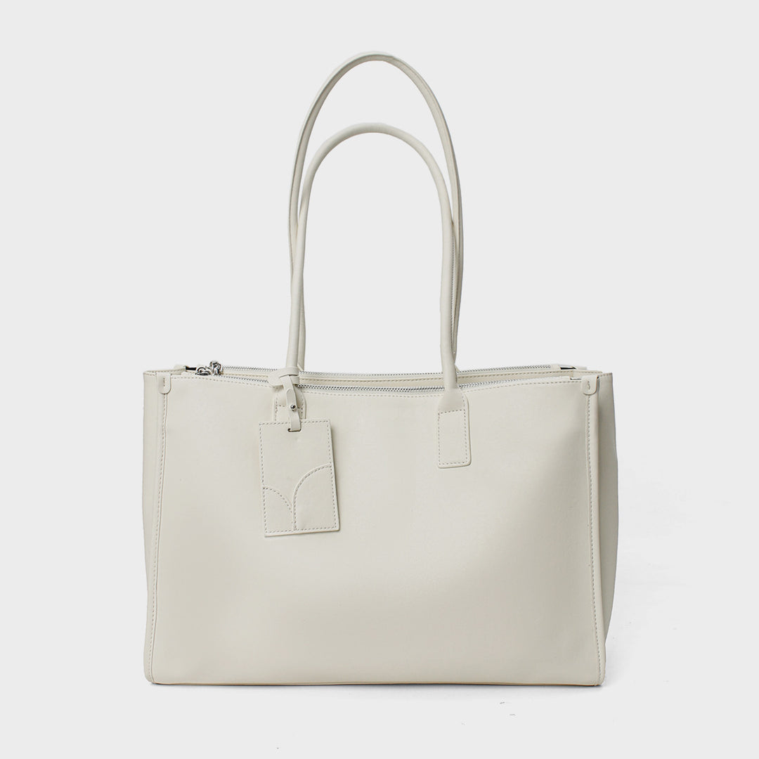 Glattes veganes Leder strukturiert Top-Zip Tote mit doppelten gerollten Griffen und Gepäckanhänger
