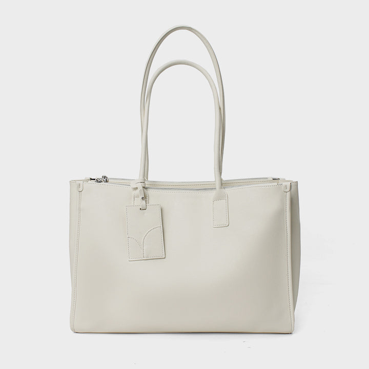 Glattes veganes Leder strukturiert Top-Zip Tote mit doppelten gerollten Griffen und Gepäckanhänger