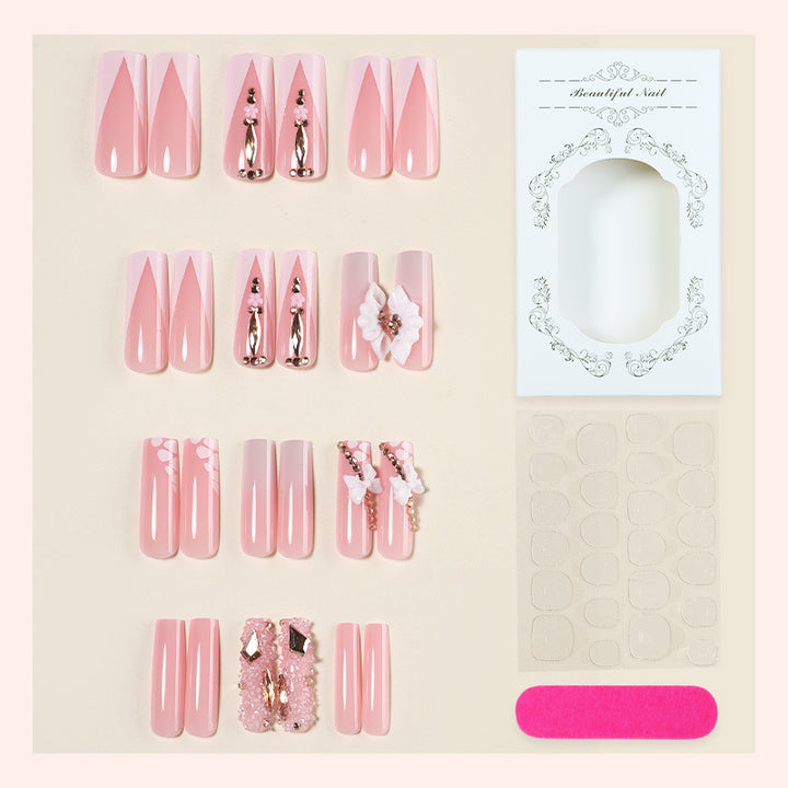 Dekorativer künstlicher Nagelset mit floralen und Juwel-Akzenten Karnz