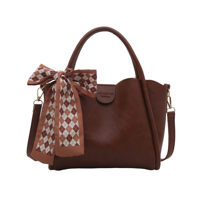 Elegante Schleifenakzent-Handtasche Karnz
