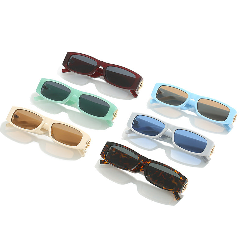 Damen modische Sonnenbrille mit asymmetrischem Rahmen und goldfarbenen Details Karnz