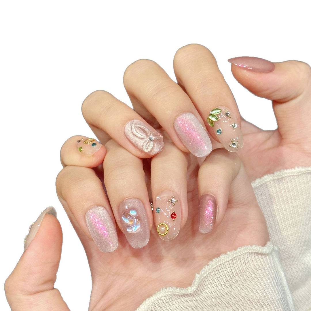 Dekoratives Press-On-Nagelkunst-Set mit einzigartigen Edelstein- und Schleifenakzenten