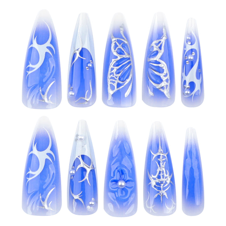 Elegante Stiletto-Kunstnägel mit floralem Design Karnz