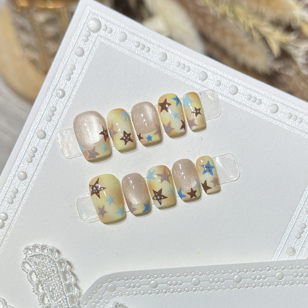 Press-On Nagelkunst Set mit Sterne Akzenten Karnz