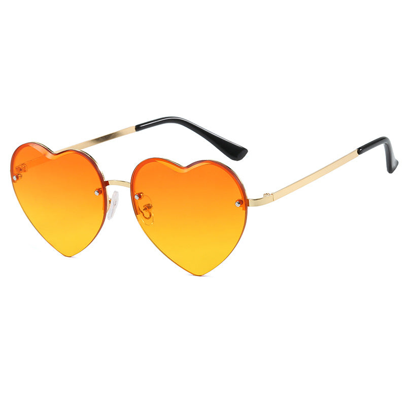Damen Herzförmige Sonnenbrille mit verspiegelten Gläsern und modischem Metallrahmen Karnz