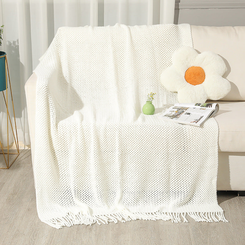 Strukturierte Strickwurfdecke