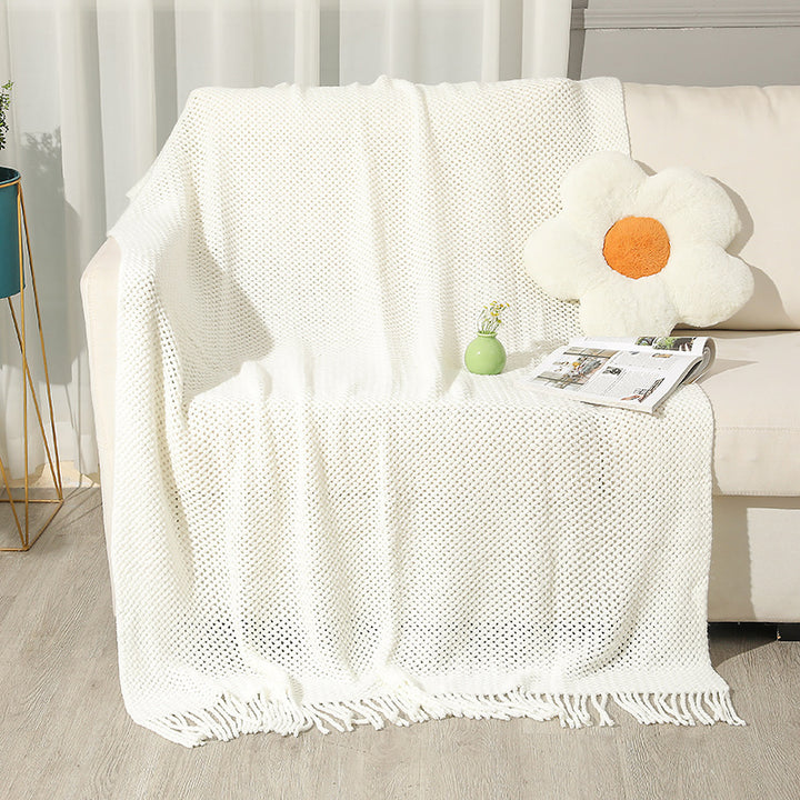 Strukturierte Strickwurfdecke