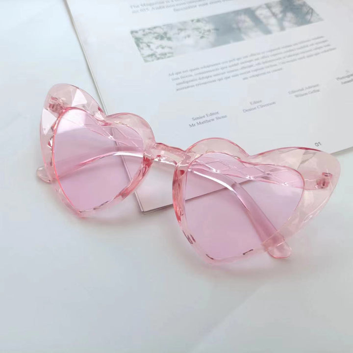 Damen Herzförmige Sonnenbrille mit transparenten Gläsern Karnz